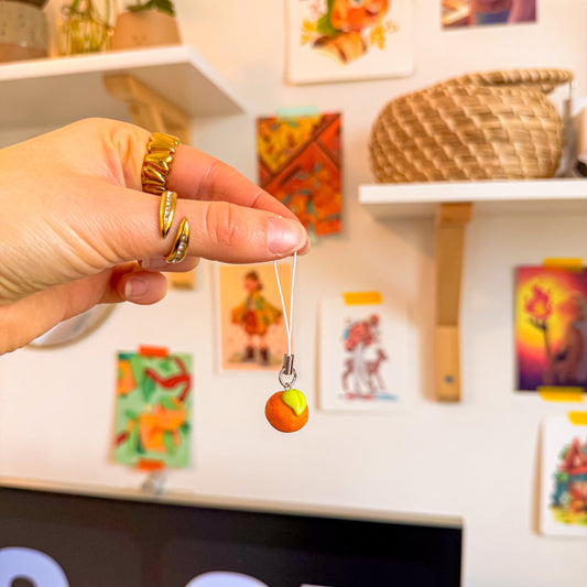 orange ⊹ phone charm